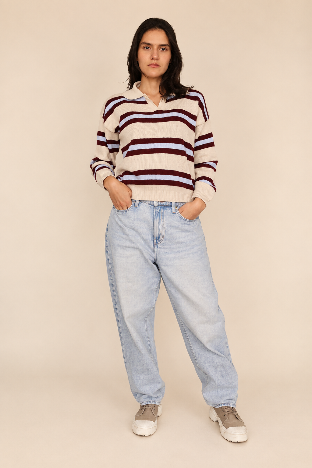 Sweater crema a rayas