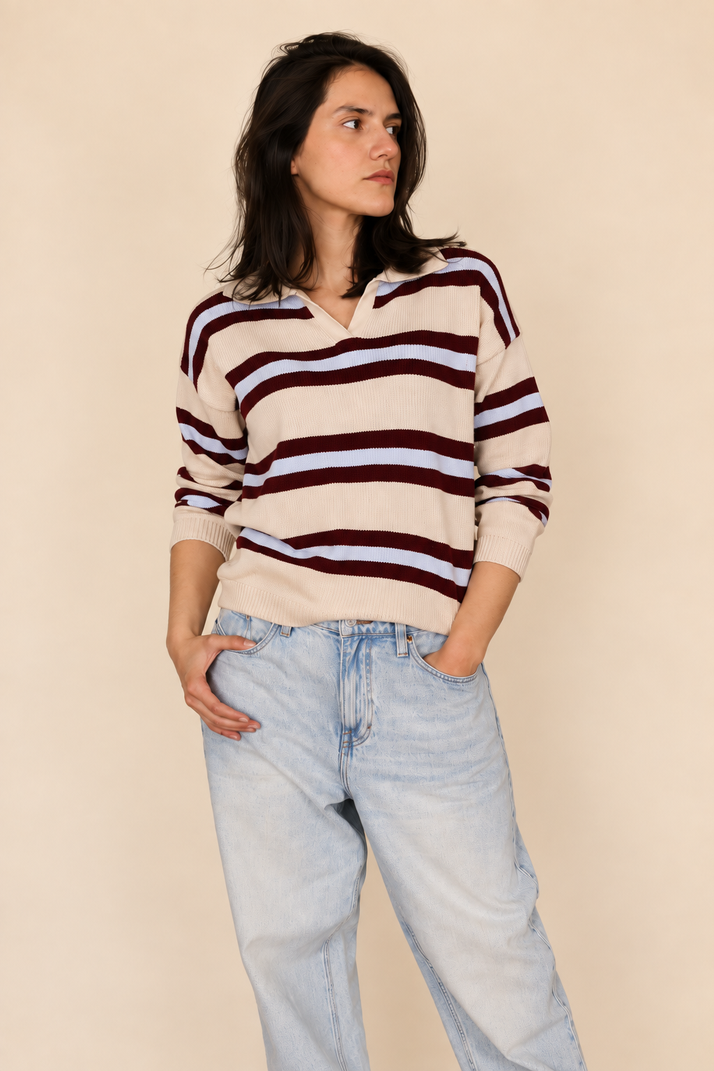 Sweater crema a rayas