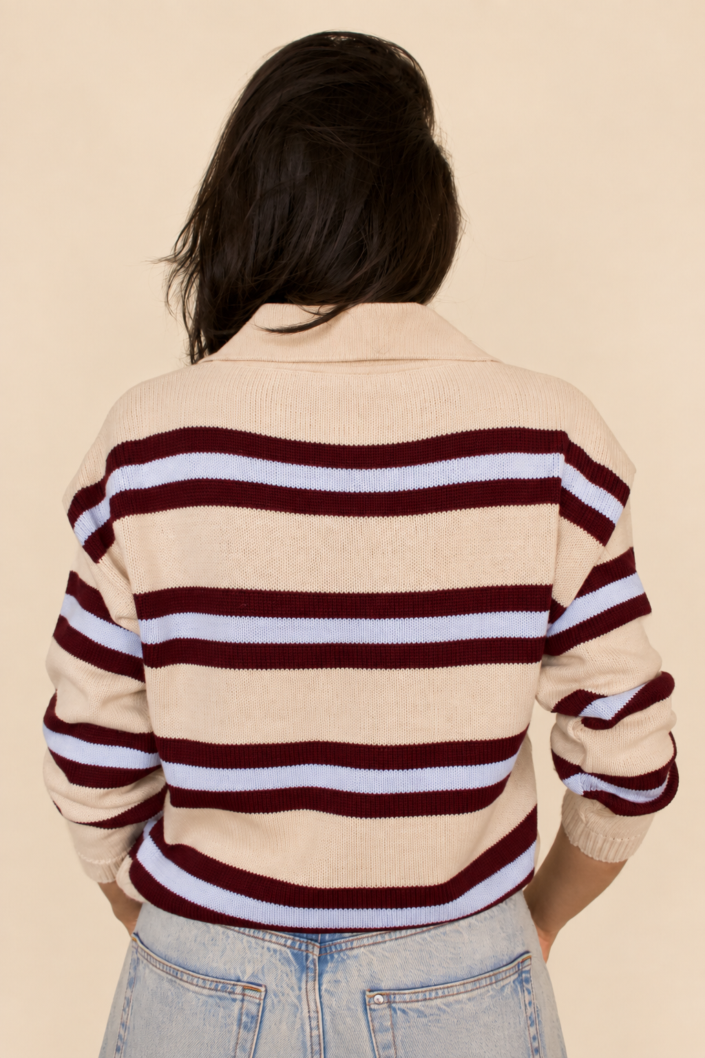 Sweater crema a rayas