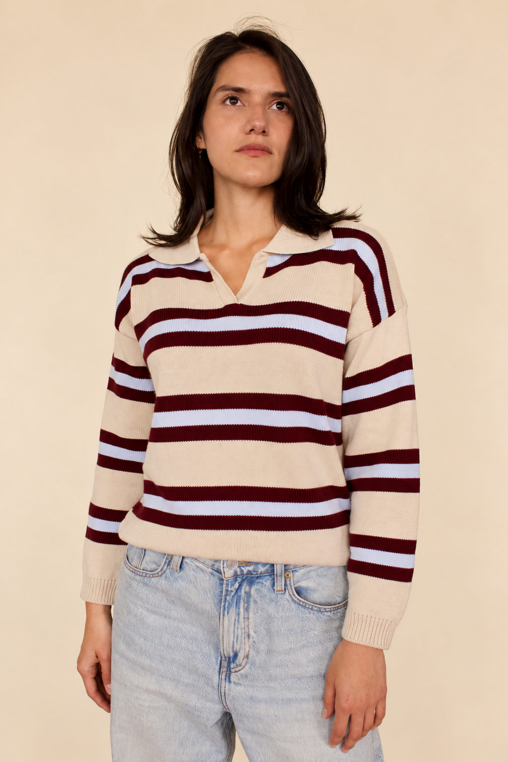 Sweater crema a rayas