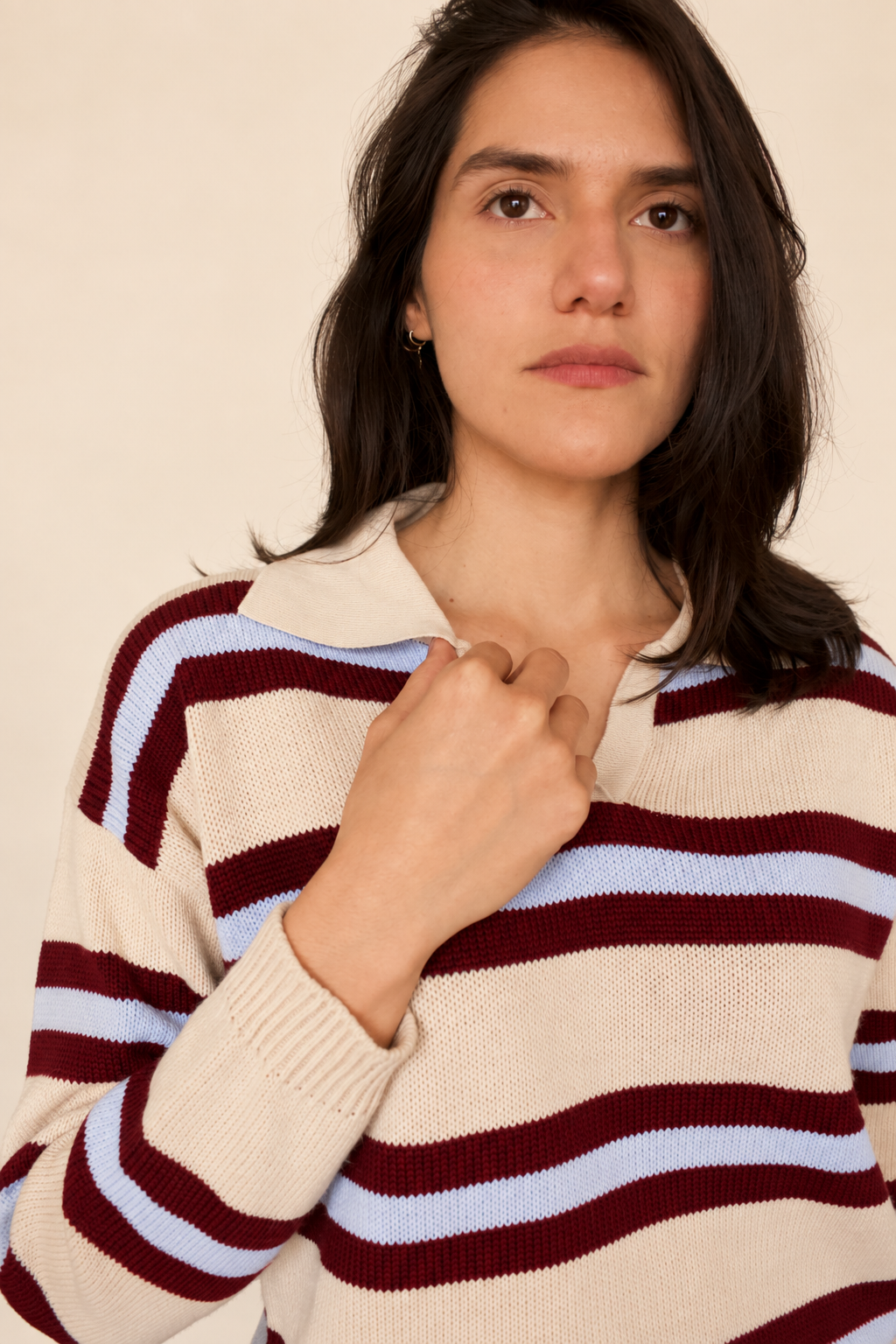 Sweater crema a rayas